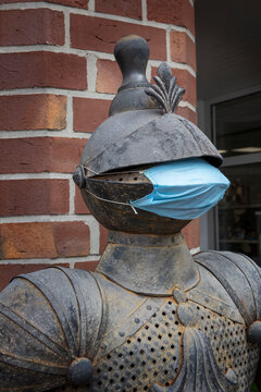 City of Meppen Germany. Armor with mouthcap. Corona related. Cover mouth. 