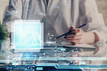 Multi exposure of hands making notes with digital coding icons. Computer learning concept.