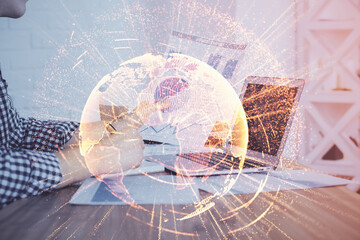 Social network theme hologram with businessman working on computer on background. Concept of world wide web. Multi exposure.