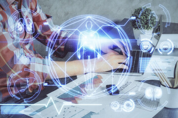 Science hologram with man working on computer on background. Concept of study. Double exposure.