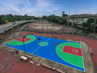 aerial view outdoor public basketball court.