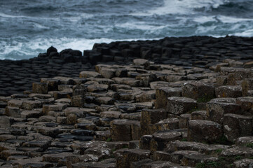 The Giant's Causeway in Northern Ireland, hexagonal rocks on the coast.