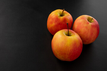 Apple on Leather background.