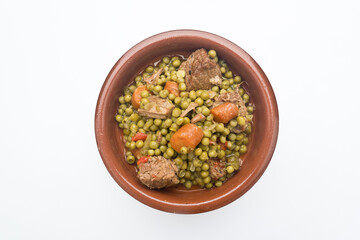 Peas, Pisum sativum, with stewed meat. With white background Asturias, Spain