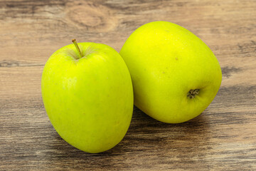 Two ripe green sweet apples