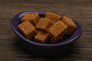 Cane sugar cubs in the bowl