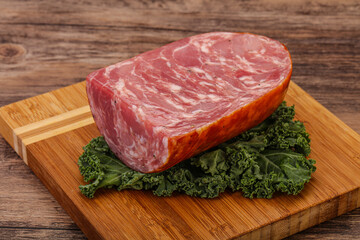 Beef ham piece over board