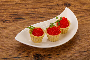 Apetizer - tartlet with red caviar