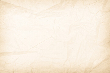 Brown recycled paper crumpled texture background. Cream Old vintage page or grunge vignette parchment old blank newspaper. Pattern empty rough cardboard creased grunge surface backdrop with space.