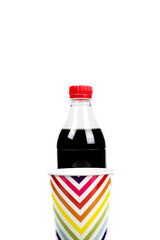 Colorful paper cups and various soda drinks on white.