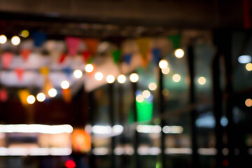 Blur the lights at the restaurant Blurred background with orange, red, light, blue, green, pink bokeh.