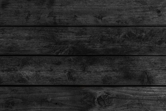 High resolution black wood plank texture and seamless background