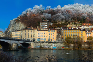 View of right bank of Isere in french city of Grenoble in winter day
