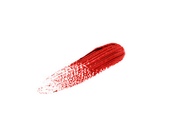 Red concealer swatch isolated on white background.