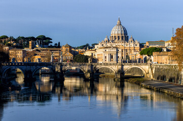 Obraz na płótnie Canvas Saint Peter basilica and Tiber river in Rome, Italy
