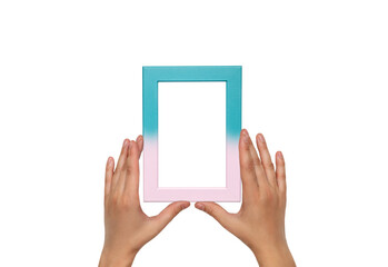 Blue with pink frame. Photo frame in female hands.