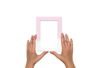 Pink with white frame. Photo frame in female hands.