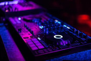 Fototapeta na wymiar professional DJ controller for mixing electronic music