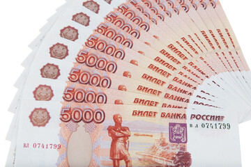 A bundle of banknotes of five thousand rubles on a white background