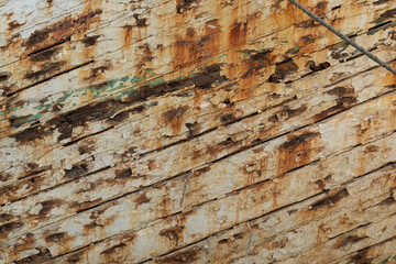 Grunge wood background with white peeling paint