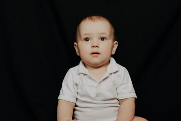 Portrait of expressive cute little baby boy