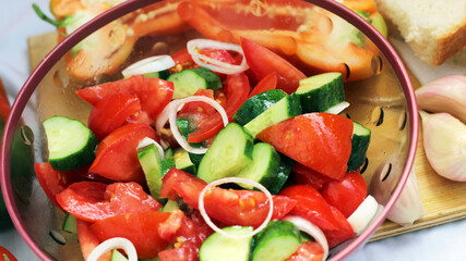 Vegetable salad with tomatoes and cucumbers