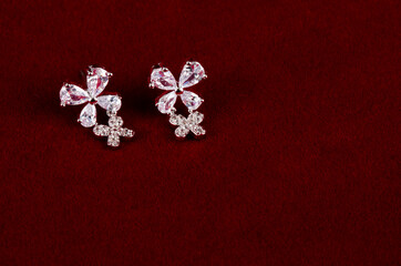 Fototapeta na wymiar Close up of diamond earrings. space for your text.
