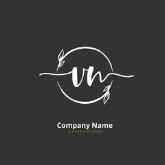 Fototapeta premium V N VN Initial handwriting and signature logo design with circle. Beautiful design handwritten logo for fashion, team, wedding, luxury logo.