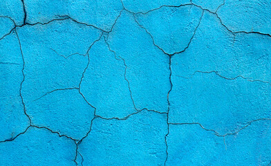 Fototapeta premium Background of blue concrete wall with cracks