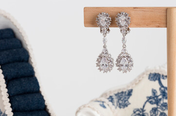 Close up of diamond earrings. space for your text.