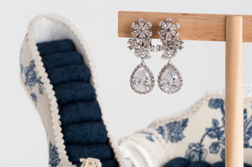 Close up of diamond earrings. space for your text.