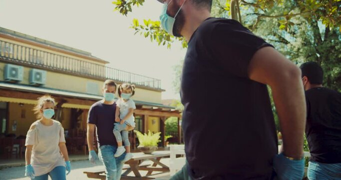 Group of friends going out after coronavirus lockdown. Lifestyle moments during covid19 period. Shot in slow motion