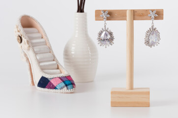 Close up of diamond earrings. space for your text.