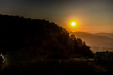 Obraz premium Puesta de sol hacia el mar desde el monte Adarra, Urnieta-Andoain