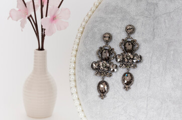 Close up of diamond earrings. space for your text.