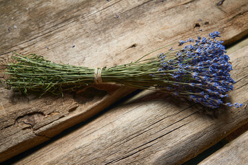 A bunch of lavender flowers on wooden planks