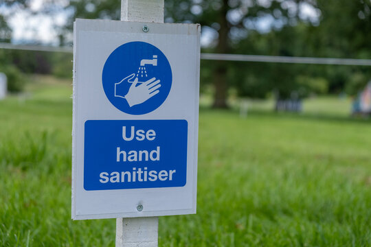 A Sign Asking Visitors To Use Hand Sanitiser At An Outdoor Event As The Coronavirus Lockdown Eases In England