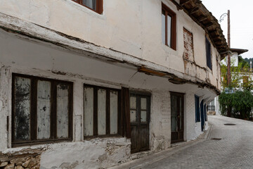 Fototapeta na wymiar old style wooden doors and windows in Thassos