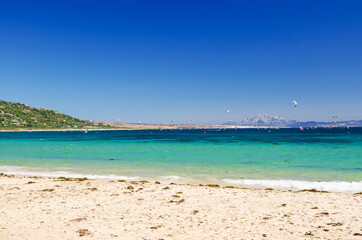 Beautiful Punta Paloma beach. A lots of kiteboarders and mount Jebel Musa in Morocco on the background. Tarifa, Province of Cadiz, Spain