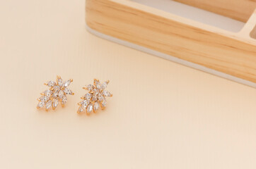 Close up of diamond earrings. space for your text.