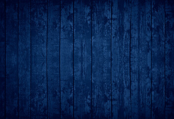 Dark blue grunge background. Toned texture of old wood. Blue vintage wooden background.