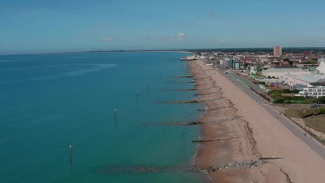 Bognor Regis, West Sussex, UK, July 29, 2020. Aerial view from Felpham towards Bognor Regis over the coastline on a sunny and warn summer day.