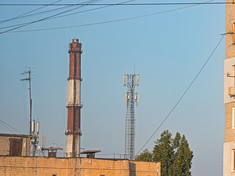 Typical Urban Infrastructure, High-Rise Buildings, Boiler Chimney, Cellular Masts, VHF and UHF Television Antennas, Telecommunications and Cable Systems
