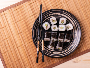 traditional asian rice fish rolls, top view shot