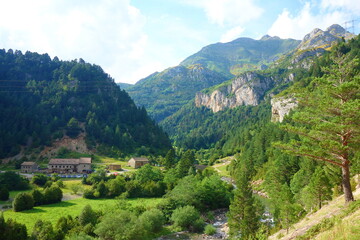 Fototapeta na wymiar Landscape with the Ara river in the Bujaruelo valley, Aragonese Pyrenees, bordering the Ordesa and Monte Perdido National Park, Huesca