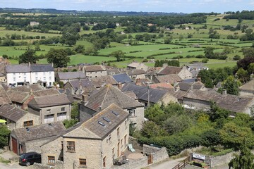 Fototapeta na wymiar A view across the village of Middleham, Yorkshire, England to rural farms.