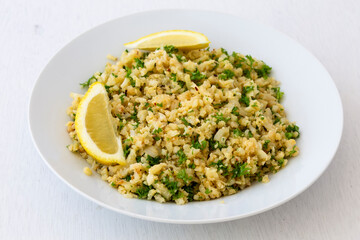 Cauliflower rice with finely chopped parsley