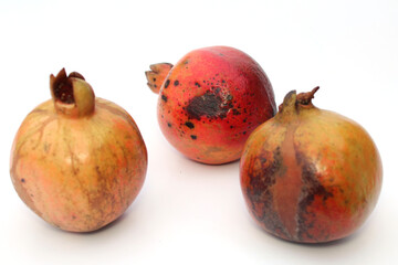 fresh healthy sweet pomegranate isolated on white background