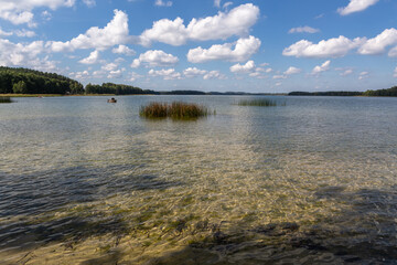 Sunny summer day by lake. taken by Lithuania