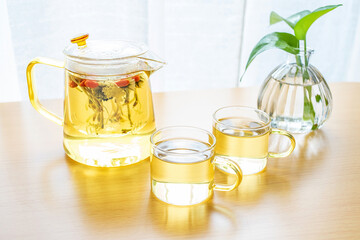 Herbal health tea brewed on the table